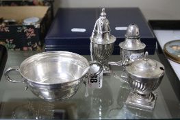 A SILVER TWIN HANDLED DISH, and a silver three piece condiment set