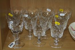 A STUART CRYSTAL GOBLET, with air twist stem, engraved 'E', together with a set of five Stuart