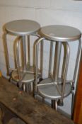 A SET OF FOUR SOUTHERN BROS MEDICAL STOOLS, with four metal legs and a pressed steel revolving