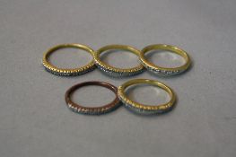 FIVE MIXED SILVER RINGS