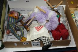 AN UNBOXED PELHAM PUPPETS CLOWN, together with three modern string puppets