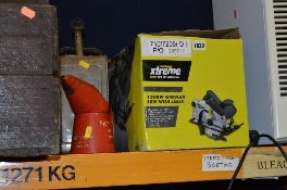 A CHALLENGE EXTREME CIRCULAR SAW, two metal fuel cans and an oil can (4)