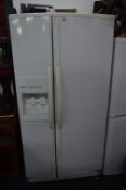 A WHIRLPOOL AMERICAN STYLE FRIDGE FREEZER, with ice and water dispeners, standing 170cm x width