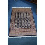 BOKHARA STYLE GROUND RUG, multi coloured, multi strap border, approximate size 190cm x 135cm