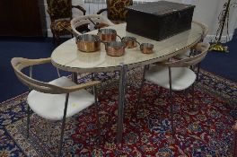A MODERN OVAL TOPPED DINING TABLE, on chrome legs, approximate size width 180cm x depth 86cm x