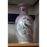 A LARGE ORIENTAL REPUBLIC OF CHINA VASE, famille rose decoration with peacocks, birds and foliage,