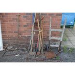 A QUANTITY OF VINTAGE GARDEN TOOLS, including a hay rack and a sack truck etc