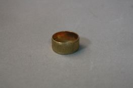 A 9CT BAND, ring size N, approximate weight 5.5 grams