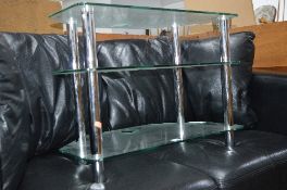 A GLASS THREE TIER TV STAND