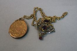 A VICTORIAN 9CT BACK AND FRONT LOCKET, and an Edwardian pendant (2)