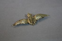 A LATE 20TH CENTURY 9CT GOLD 'RAF' WINGS BROOCH, measuring approximately 60mm in length,