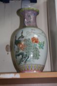 A LARGE ORIENTAL REPUBLIC OF CHINA VASE, decorated with peacocks and foliage, orange square