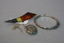 A SILVER AMBER BROOCH, silver bangle, necklace and pendant