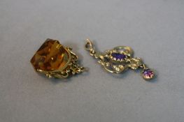 AN EDWARDIAN 9CT AMETHYST DROP PENDANT, and a 9ct fob