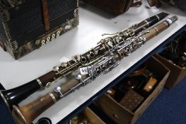TWO OBOES, both unmarked, one wood and bakelite, the other composition