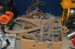 A BOX AND A CRATE OF TOOLS, including brackets and bridle hangers