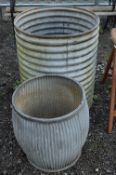 A LARGE GALVANISED BARREL, and a galvanised dolly tub (2)