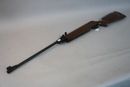 A .22'' SIDE LEVER BREAK ACTION SPRING AIR RIFLE, bearing no makers name or serial number, it