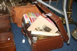 A SUITCASE OF SUNDRIES, to include maps, photographs, playing cards, inkwell, a leather satchel etc