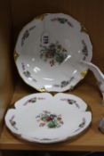 TWO ROYAL WORCESTER PLATES, florally decorated with trim, black backstamp, diameters 21.5cm (2)