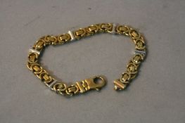 A LATE 20TH CENTURY 9CT YELLOW AND WHITE GOLD FANCY LINK BRACELET, measuring approximately 195mm