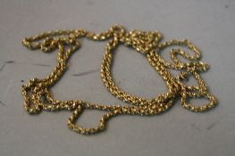 A VICTORIAN GUARD CHAIN, faceted oval belcher and knot design links, measuring approximately