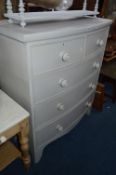 A PAINTED VICTORIAN PINE BOWFRONT CHEST OF FIVE DRAWERS
