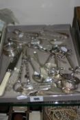 A TRAY OF MIXED SILVER, to include sugar tongs, spoons and others