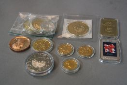 A BAG OF MIXED COINS, including two ingots