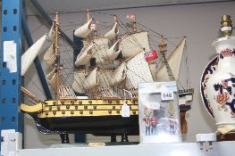 TWO MODEL SHIPS INCLUDING HMS VICTORY, and a boxed Britains sentry box set (3)