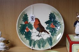 A MOORCROFT POTTERY PLATE, tube line decorated with Robin and Holly, impressed and painted marks