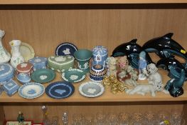 A GROUP OF CERAMICS, to include Wedgwood Jasperwares, Belleek vases, Poole Dolphins, Wade Teddies