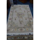 A CHINESE STYLE WOOL CARPET SQUARE, cream ground, approximate size 280cm x 184cm and another similar
