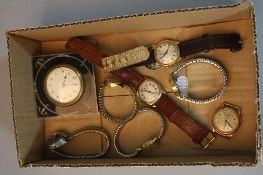 A BOX OF MIXED WATCHES, including two 9ct and a tortoiseshell and silver eight day clock frame (8)