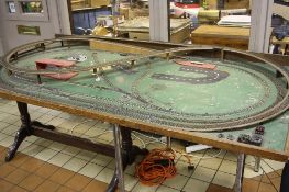 A OO GAUGE THREE RAIL MODEL RAILWAY LAYOUT, comprising two ovals and figure of eight track layout,