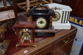 A PAINTED METAL MANTLE CLOCK, and two other mantle clocks (3)