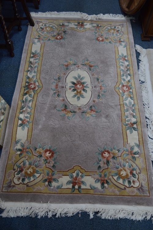 A CHINESE STYLE WOOL CARPET SQUARE, cream ground, approximate size 280cm x 184cm and another similar - Bild 2 aus 2