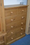 A MODERN PINE CHEST OF TWO SHORT AND FOUR LONG DRAWERS, approximate size height 123cm x width 92cm x