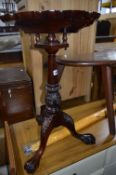 A VICTORIAN STYLE MAHOGANY CIRCULAR TILT TOP TRIPOD TABLE WITH SWIVEL TOP