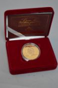 A GOLD CENTENARY CROWN THE QUEEN MOTHER FIVE POUND 22K GOLD COIN, 39.94 grams, 2000, issue limit 3,