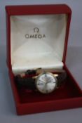 A GENTS 9CT GOLD OMEGA AUTOMATIC GENEVE WRISTWATCH, (boxed)