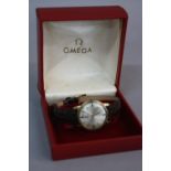 A GENTS 9CT GOLD OMEGA AUTOMATIC GENEVE WRISTWATCH, (boxed)