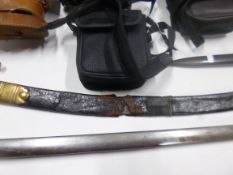 AN ASIAN CURVED SWORD, late 19th Century possibly early 20th Century, poor quality workmanship and