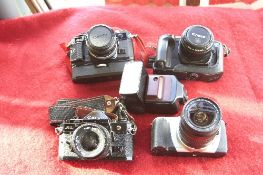 CANON A1 CAMERA AND 50MM 1:8 LENS AND MOTORWINDER, Canon A1 and Canon 24mm F2.8, Canon E08 650 and
