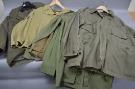 SIX ITEMS OF WWII ERA MILITARY UNIFORM, to include jackets, field jackets and shirts, all believed