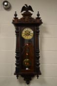 A LATE 19TH CENTURY WALNUT AND EBONISED VIENNA REGULATOR WALL CLOCK, Eagle surmount to pediment