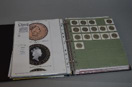 AN ALBUM OF MIXED UK COINAGE, to include .925 and .500 silver coins, 50 pence collections to include