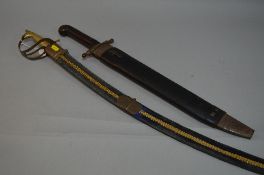 A LARGE CURVED STEEL SWORD IN SCABBARD, made in India, believed Tourist piece, a large steel blade