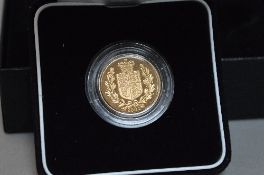 A GOLD PROOF SOVEREIGN UNITED KINGDOM, boxed with certificate of authenticity 09125