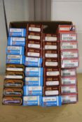 A QUANTITY OF BOXED OO GAUGE COACHING STOCK AND BOGIE VANS, LIMA, MAINLINE, AIRFIX AND G.M.R.,